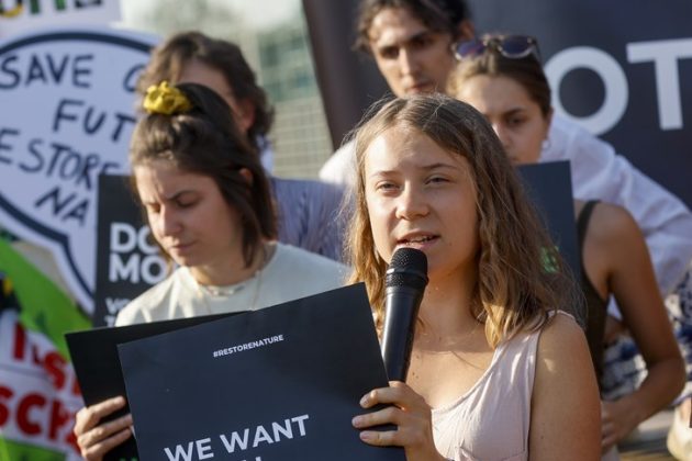 Farmers have faced off against teenage green activist Greta Thunberg outside the European Parliament in Strasbourg over planned restrictions on environmental damage. (EPA-EFE/JULIEN WARNAND)
