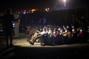 Migrants arrive in Europe. Will the illegal ones now go home if they are paid with EU millions? (Photo by Lorenzo Palizzolo/Getty Images)