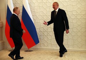 Azeri President Aliyev welcomes Putin with a big smile. Why not? The West tries not to buy oil from Putin, so it pretends Aliyev is cleaner. Just smile, and clear the corpses. (Photo by Contributor/Getty Images)