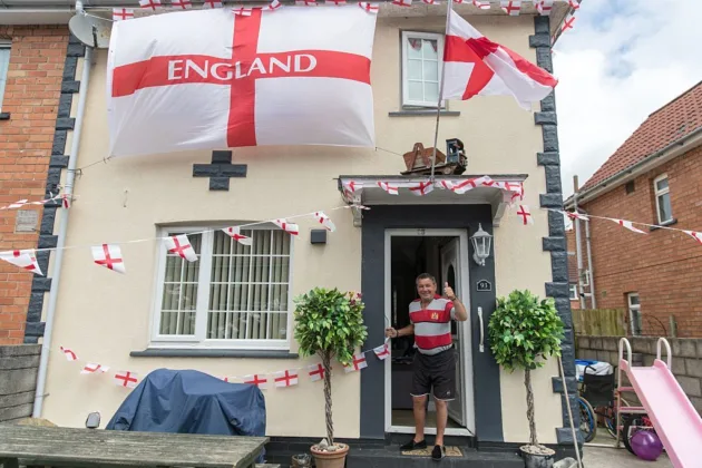 A number of local authorities across England have warned residents not to display England flags on public property during the World Cup, prompting criticism from those who see the measures as an attack on expressions of national pride. (Photo by Matt Cardy/Getty Images)