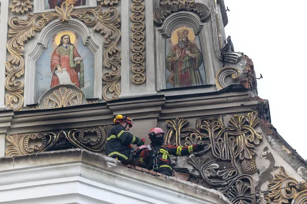 Russian missiles set fire to Kyiv cathedral as overnight strikes kill nine